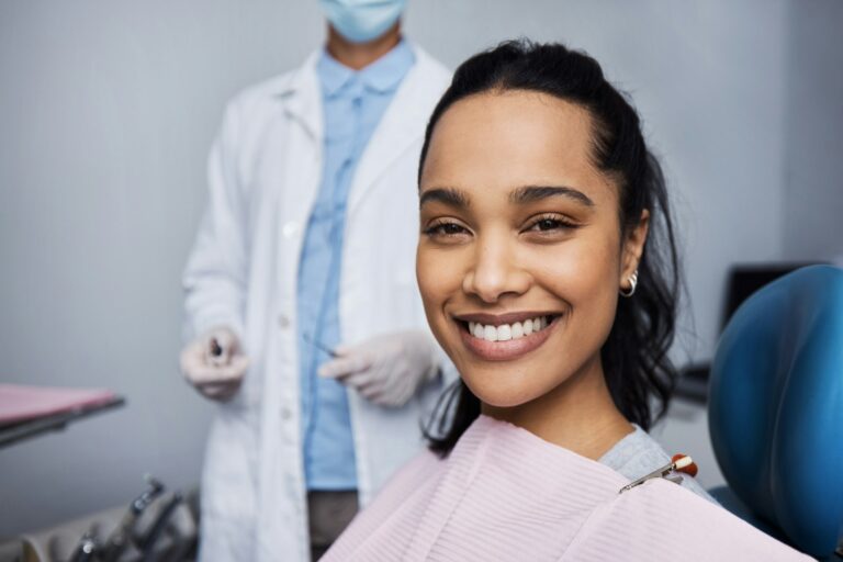 Portrait of a young woman having dental work done on her teeth